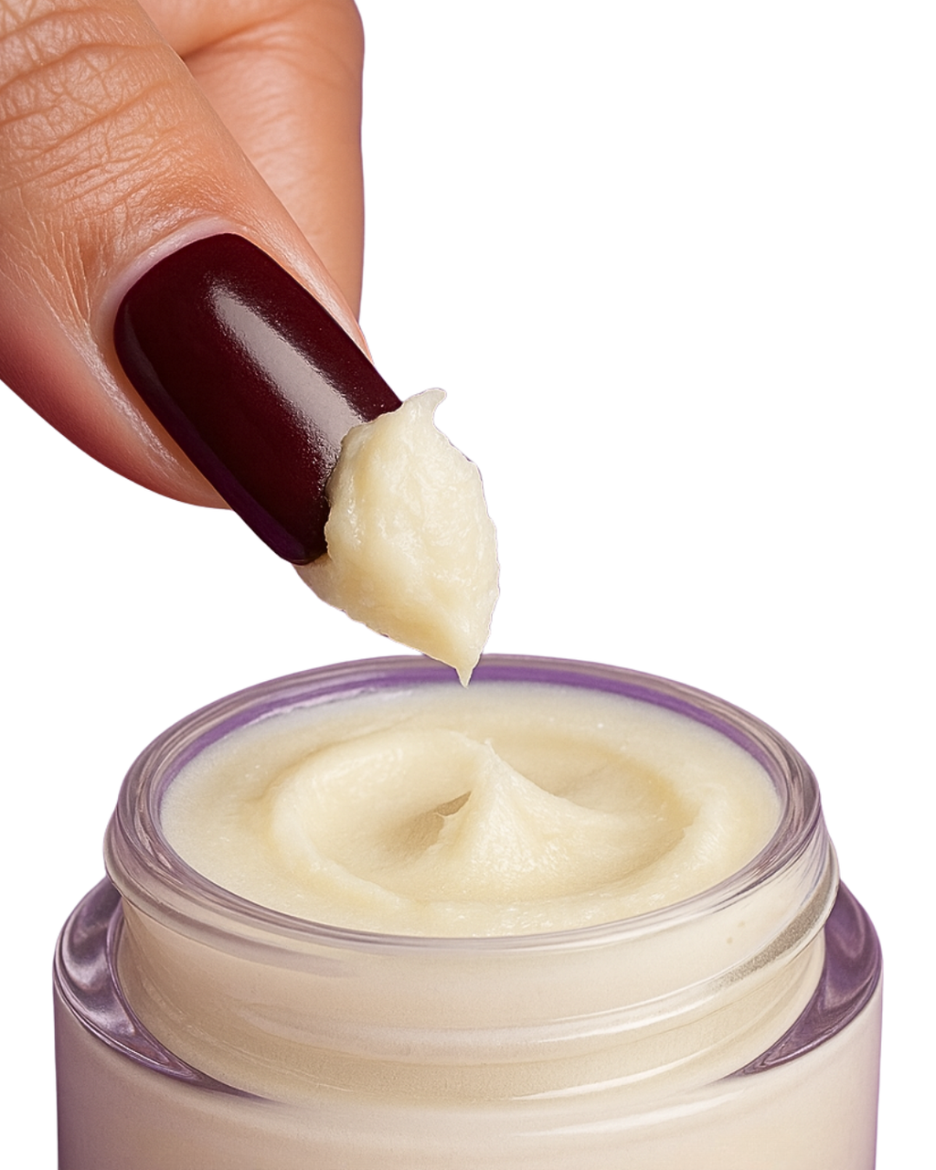 Hand with dark nail polish scooping calm care eye & lip mask from a jar on a white background