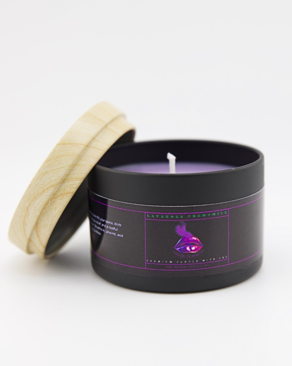 lavender chamomile candle in black tin with wooden lid on a white background